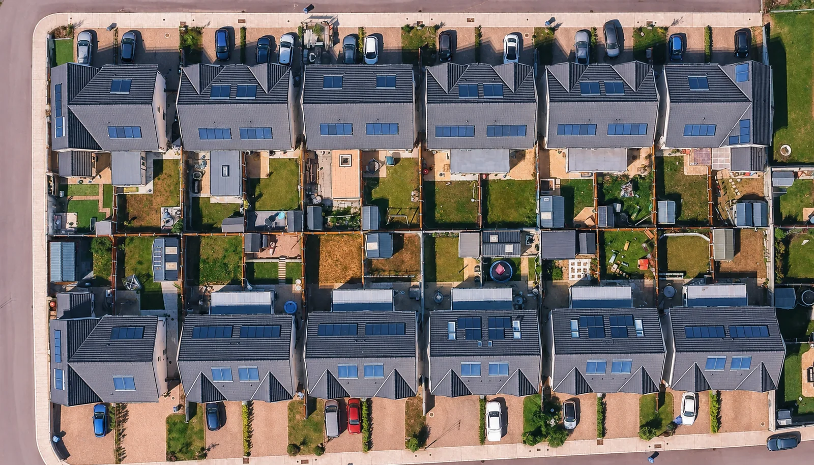 Aerial view of neighbouring homes with rooftop solar panels